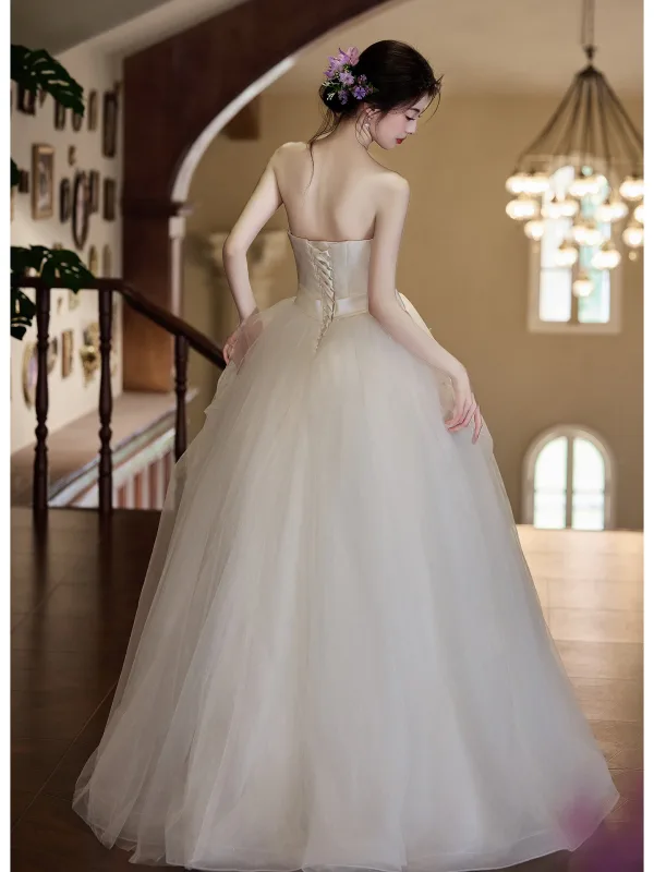 Charmant Ivory / Creme Applikationen Schleife Stoffgürtel Leichtes Brautkleider / Hochzeitskleider 2025 Ballkleid Bandeau Ärmellos Rückenfreies Lange