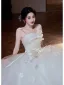 Charmant Ivory / Creme Applikationen Schleife Stoffgürtel Leichtes Brautkleider / Hochzeitskleider 2025 Ballkleid Bandeau Ärmellos Rückenfreies Lange
