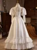 Medieval Vintage / Retro Ivory Satin Lace Wedding Dresses 2024 A-Line / Princess High Neck Puffy Short Sleeve Backless Floor-Length / Long Wedding