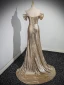 Scintillantes Doré Paillettes Robe De Soirée 2023 Trompette / Sirène De l'épaule Manches Courtes Dos Nu Train De Balayage Soirée Robe De Ceremonie