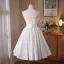Charmant Blanche Faux Diamant Noeud de retour Robe De Graduation 2025 Robe Boule Bustier Sans Manches Dos Nu Longue Robe De Ceremonie
