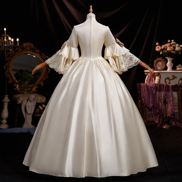 Vintage / Retro Medieval Champagne Sequins Bow Lace Flower Cosplay Prom Dresses 2025 Ball Gown High Neck Bell sleeves Floor-Length / Long Formal Dresses