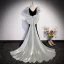 Fashion Black Suede Prom Dresses 2023 Trumpet / Mermaid Square Neckline Puffy Short Sleeve Backless Bow Sweep Train Prom Formal Dresses