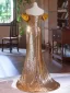 Sexy Doré Paillettes Robe De Soirée 2024 Trompette / Sirène Bustier Noeud Sans Manches Dos Nu Train De Balayage Soirée Robe De Ceremonie