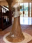 Scintillantes Doré Paillettes Robe De Bal 2024 Trompette / Sirène De l'épaule Manches Courtes Dos Nu Train De Balayage Promo Robe De Ceremonie