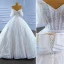 Best Charming White Beading Pearl Sequins Wedding Dresses 2022 Ball Gown Strapless Sleeveless Backless Sash Chapel Train Wedding