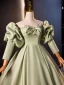 Elegant Sage Green Satin Prom Dresses 2023 Ball Gown Strapless Puffy Short Sleeve Backless Bow Sweep Train Formal Dresses