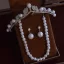 Fine Sølv Perle Rhinestone Legering Bryllup Armbånd Øredobber Tiara Har Tilbehor 2025