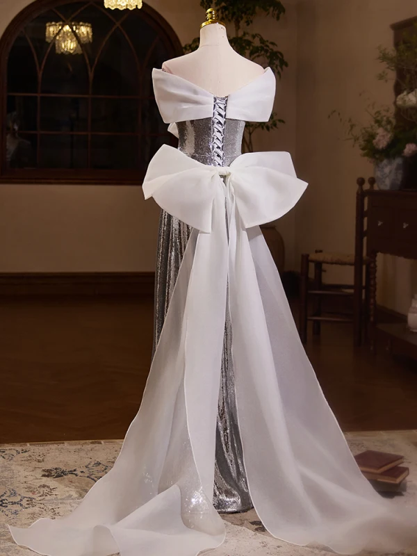 Scintillantes Argenté Paillettes Robe De Bal 2024 Princesse De l'épaule Sans Manches Dos Nu Noeud Longue Promo Robe De Ceremonie