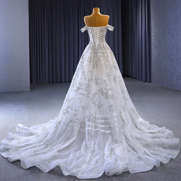 Haut de Gamme Blanche Fait main Perlage Paillettes Robe De Mariée 2023 Princesse De l'épaule Sans Manches Dos Nu Tribunal Train Mariage