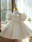 Chic / Beautiful Champagne Pearl Birthday Short Flower Girl Dresses 2024 Ball Gown Scoop Neck Puffy Short Sleeve Bow
