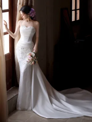Elegant White Pearl Rhinestone Satin Wedding Dresses 2025 Trumpet Mermaid Strapless Sleeveless Backless Bow Court Train