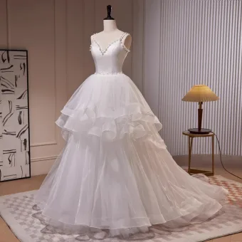 Fashion White Cascading Ruffles Wedding Dresses 2023 Ball Gown Spaghetti Straps Pearl Sleeveless Backless Sweep Train Wedding