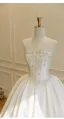 Luxe Ivoire Fait main Faux Diamant Satin Robe De Mariée 2026 Robe Boule Bustier Sans Manches Dos Nu Longue