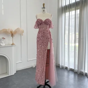 High End Sexy Rødmende Rosa Håndlaget Beading Paljetter Fendue Devant Ballkjoler 2024 Trompet Havfrue Spaghettistropper Korte Ermer Ryggløse Lange Ball