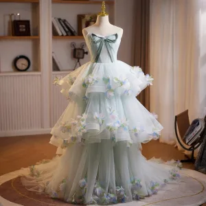 Fée Des Fleurs Vert Cendré Appliques Volants En Cascade Robe De Bal 2026 Robe Boule Bustier Noeud Sans Manches Dos Nu Train De Balayage Robe De Ceremonie