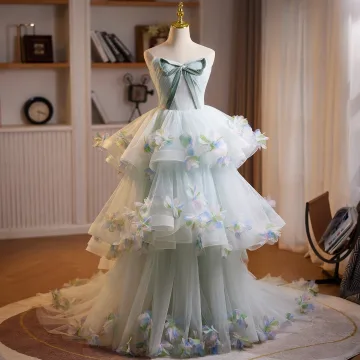 Fée Des Fleurs Vert Cendré Appliques Volants En Cascade Robe De Bal 2026 Robe Boule Bustier Noeud Sans Manches Dos Nu Train De Balayage Robe De Ceremonie