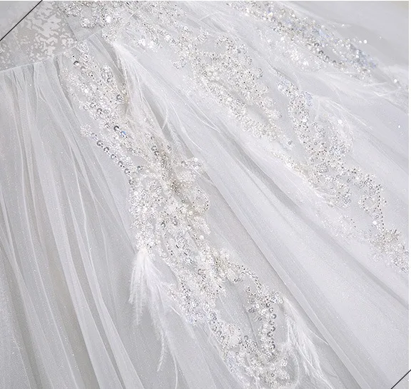 Charmant Blanche Perlage Paillettes Robe De Bal 2025 Robe Boule Bretelles Spaghetti Sans Manches Dos Nu Longue Robe De Ceremonie