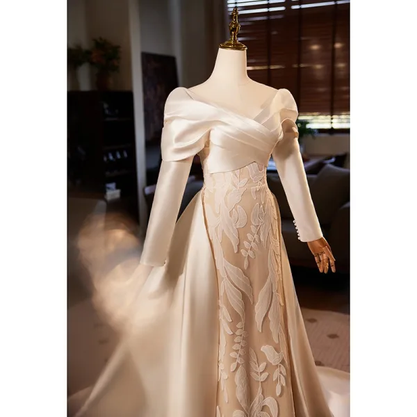 Vintage / Retro Champagne Satin Wedding Dresses 2024 Trumpet / Mermaid V-Neck Long Sleeve Backless Sweep Train Wedding