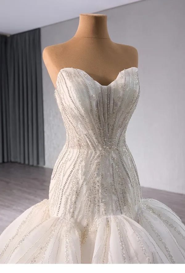Haut de Gamme Blanche Fait main Perlage Paillettes Trompette / Sirène Robe De Mariée 2024 Bustier Sans Manches Dos Nu Tribunal Train Mariage