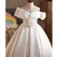 Elegant White Pearl Flower Satin Wedding Flower Girl Dresses 2026 Ball Gown Off-The-Shoulder Short Sleeve Floor-Length / Long