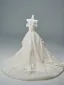 Luxury / Gorgeous Beige Cascading Ruffles Appliques Prom Dresses 2026 Ball Gown Off-The-Shoulder Short Sleeve Backless Chapel Train Formal Dresses