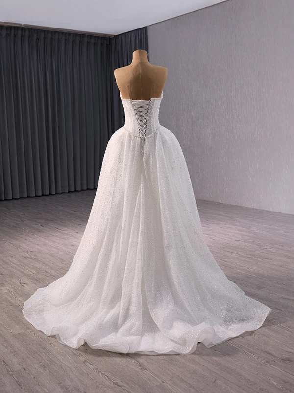 Luxe Blanche Fait main Perlage Perle Paillettes Robe De Mariée 2024 Trompette / Sirène Bustier Sans Manches Dos Nu Noeud Train De Balayage Mariage