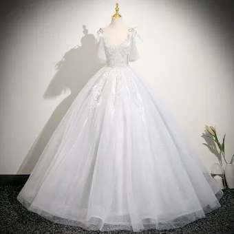 Charmant Blanche Perlage Paillettes Robe De Bal 2025 Robe Boule Bretelles Spaghetti Sans Manches Dos Nu Longue Robe De Ceremonie
