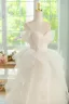 Charmant Beige Perlenstickerei Fallende Rüsche Ballkleider 2024 Ballkleid Spaghettiträger Ärmellos Rückenfreies Lange Ball Festliche Kleider