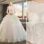 Audrey Hepburn Style Ivory Wedding Dresses 2019 Ball Gown Scoop Neck Beading Lace Flower Pearl Long Sleeve Chapel Train