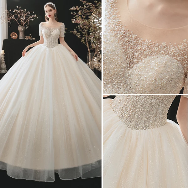 Elegant Elfenben Brudekjoler 2018 Ballkjole Blonder Appliques Krystall Kjæreste Ryggløse Uten Ermer Cathedral Train Bryllup