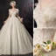 Audrey Hepburn Style Champagne Wedding Dresses 2019 Ball Gown Scoop Neck Lace Flower Short Sleeve Backless Cathedral Train