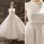 Élégant Couleur Unie Ivoire Robe De Mariée 2019 Princesse Encolure Dégagée Sans Manches En Dentelle Longue