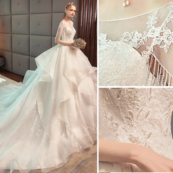 Charming Ivory Wedding Dresses 2019 Ball Gown Scoop Neck Lace Flower Beading Tassel Short Sleeve Backless Cascading Ruffles Cathedral Train Wedding