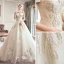 Schöne Champagner Brautkleider / Hochzeitskleider 2019 A Linie Off Shoulder Perlenstickerei Strass Spitze Blumen Kurze Ärmel Rückenfreies Königliche Schleppe