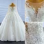 Luxury / Gorgeous Ivory Beading Crystal Wedding Dresses 2021 Ball Gown Glitter Sequins Scoop Neck Long Sleeve Cathedral Train Wedding