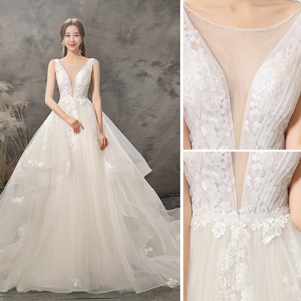 Élégant Champagne Robe De Mariée 2019 Princesse Encolure Dégagée Appliques Cristal En Dentelle Fleur Sans Manches Dos Nu Chapel Train