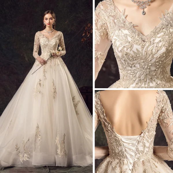 Charmant Champagner Brautkleider / Hochzeitskleider 2019 A Linie Tiefer V-Ausschnitt Perlenstickerei Pailletten Spitze Blumen Lange Ärmel Rückenfreies Kapelle-Schleppe