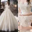 Elegant Ivory Wedding Dresses 2019 A-Line / Princess Off-The-Shoulder Beading Appliques Lace Flower Short Sleeve Backless Royal Train