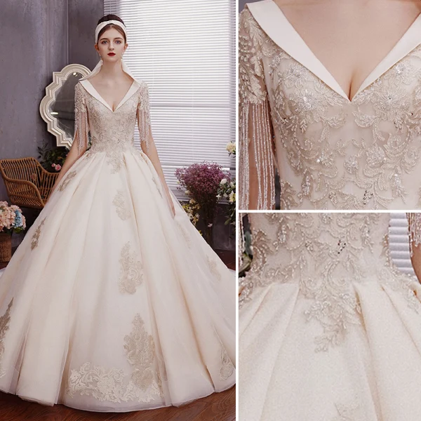 Charmant Champagner Brautkleider / Hochzeitskleider Ballkleid 2019 Tiefer V-Ausschnitt Perlenstickerei Quaste Perle Spitze Blumen Pailletten Kurze Ärmel Rückenfreies Königliche Schleppe