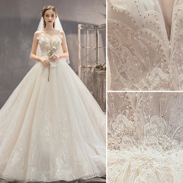 Fabuleux Champagne Robe De Mariée 2019 Princesse Bustier Perlage Paillettes Sans Manches Dos Nu Appliques Noeud Royal Train