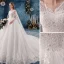 Charmant Ivoire Robe De Mariée 2019 Princesse V-Cou Perlage Paillettes Appliques Perle En Dentelle Fleur Sans Manches Dos Nu Watteau Train