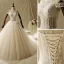 Élégant Ivoire Robe De Mariée 2019 Princesse Encolure Dégagée Perlage En Dentelle Fleur Manches Courtes Dos Nu Cathedral Train
