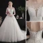 Élégant Ivoire Robe De Mariée 2019 Princesse Encolure Dégagée Perlage Paillettes En Dentelle Fleur Manches Courtes Dos Nu Cathedral Train