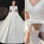 Elegant Enkel Satin Elfenben Sløyfe Brudekjoler 2021 Ballkjole V-Hals Korte Ermer Ryggløse Royal Train Bryllup