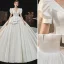 Vintage Audrey Hepburn-Stil Mittelalterlich Ivory / Creme Satin Brautkleider / Hochzeitskleider 2021 Ballkleid Tiefer V-Ausschnitt Geschwollenes Kurze Ärmel Rückenfreies Königliche Schleppe Hochzeit