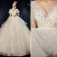 High-end Ivory Wedding Dresses 2020 Ball Gown V-Neck Beading Pearl Sequins Lace Flower Appliques Short Sleeve Backless Royal Train
