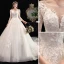 Fabuleux Ivoire Robe De Mariée 2020 Princesse Encolure Dégagée Perle Faux Diamant En Dentelle Fleur 3/4 Manches Dos Nu Cathedral Train