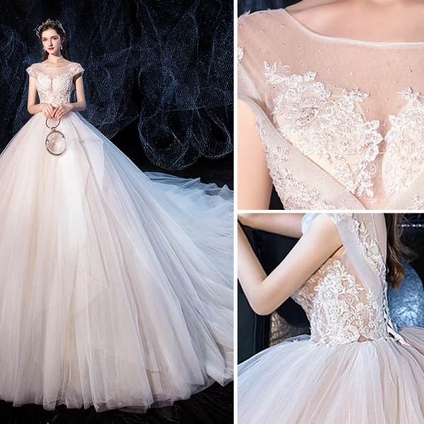 Haut de Gamme Ivoire Robe De Mariée 2020 Robe Boule Encolure Dégagée Perlage En Dentelle Fleur Sans Manches Dos Nu Royal Train