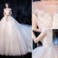 Haut de Gamme Ivoire Robe De Mariée 2020 Robe Boule Encolure Dégagée Perlage En Dentelle Fleur Sans Manches Dos Nu Royal Train